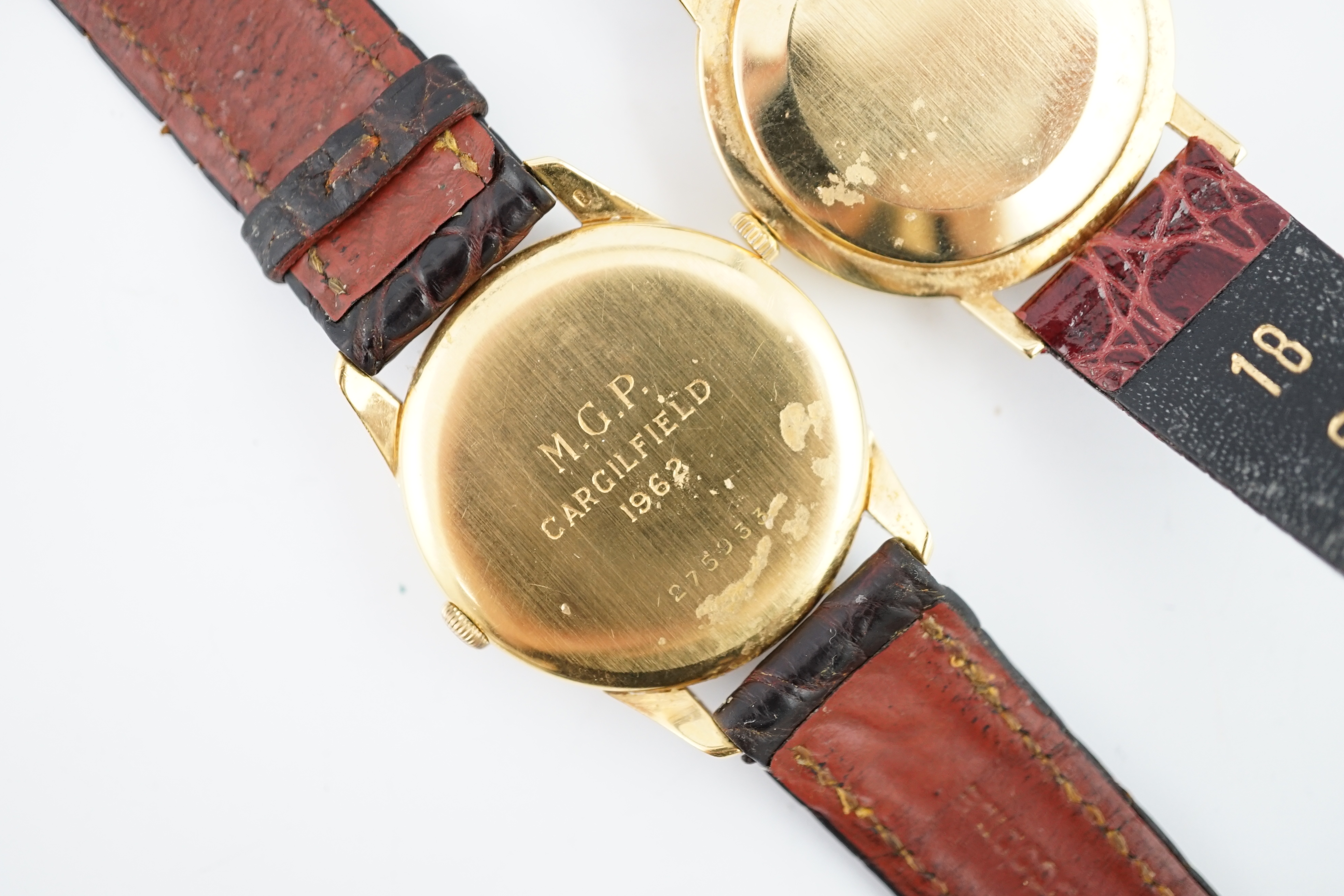 A gentleman's 1960's 18ct? gold Juvenia manual wind wrist watch, on a leather strap and a gentleman's 18ct? gold Marvin manual wind wrist watch, on a leather strap